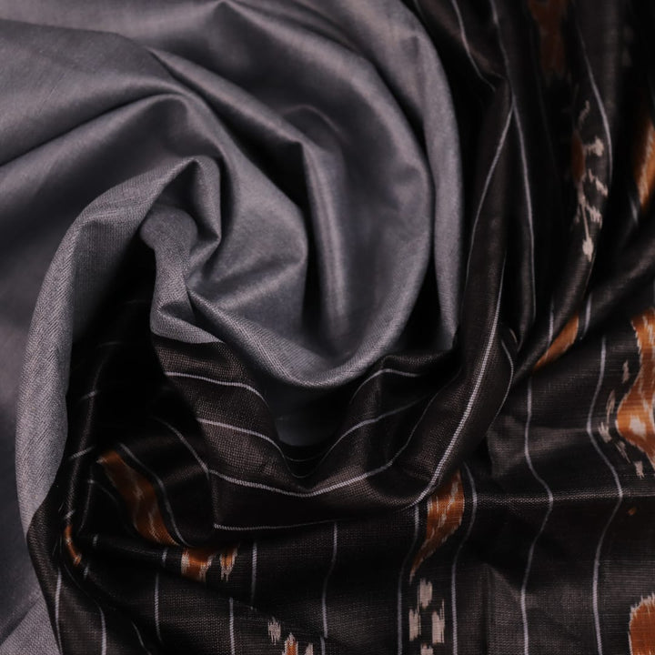 Close-up of Grey and Blue Tussar Silk Saree's Fabric Texture