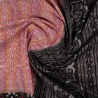 Model wearing a black Sambalpuri cotton saree with multi-color Pasapalli pattern in a full drape.