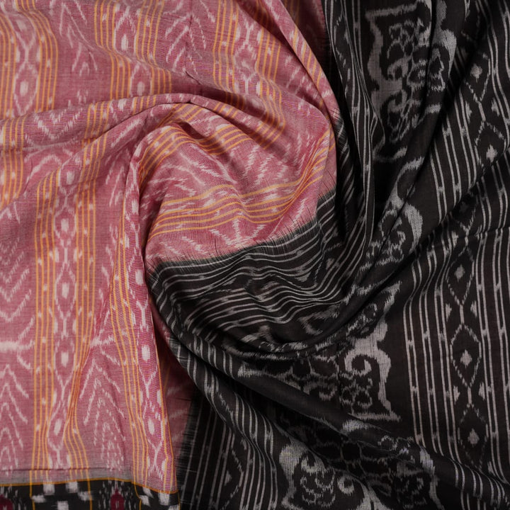 Model wearing a black Sambalpuri cotton saree with multi-color Pasapalli pattern in a full drape.