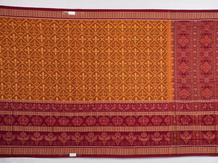 Complete flat layout of the brown and maroon Sambalpuri cotton saree showcasing all patterns and motifs.