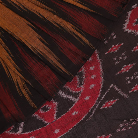 Brown and black plain Sambalpuri cotton saree styled, showcasing its elegant drape and subtle colors.