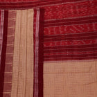 Draped plain cream and maroon Sambalpuri cotton saree.
