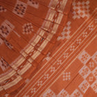Model draped in a maroon and brown Sambalpuri cotton saree showcasing traditional Odisha handloom style.