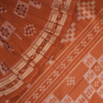 Model draped in a maroon and brown Sambalpuri cotton saree showcasing traditional Odisha handloom style.