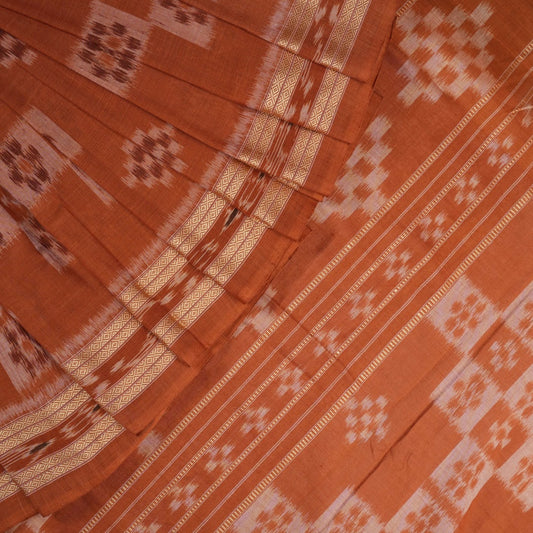Model draped in a maroon and brown Sambalpuri cotton saree showcasing traditional Odisha handloom style.