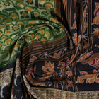 Full layout of green and black Sambalpuri cotton saree showcasing the complete pattern and motifs.