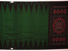 Green and black plain Sambalpuri cotton saree gracefully draped on a model, highlighting its elegant styling.