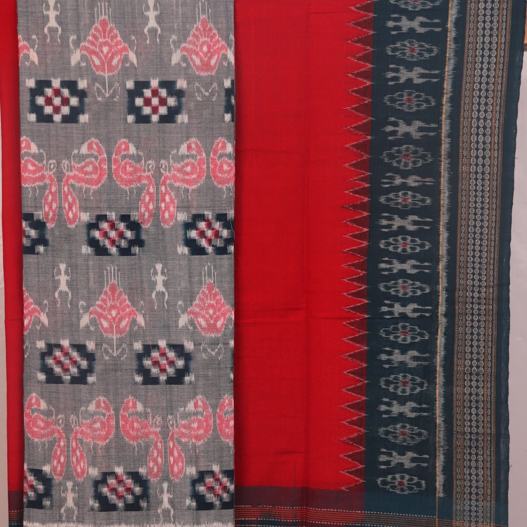 Detail of grey Sambalpuri Cotton dress material blouse piece with red motifs.