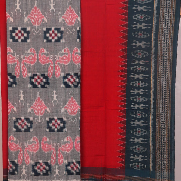 Detail of grey Sambalpuri Cotton dress material blouse piece with red motifs.