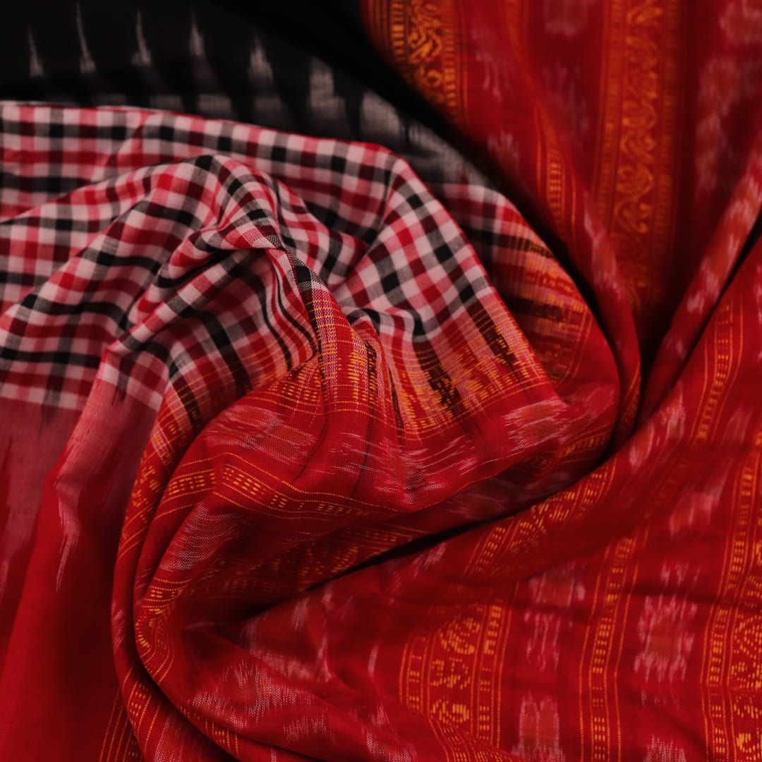 Full view of a multi-colored Bomkai cotton saree featuring a butta pattern with a red border.