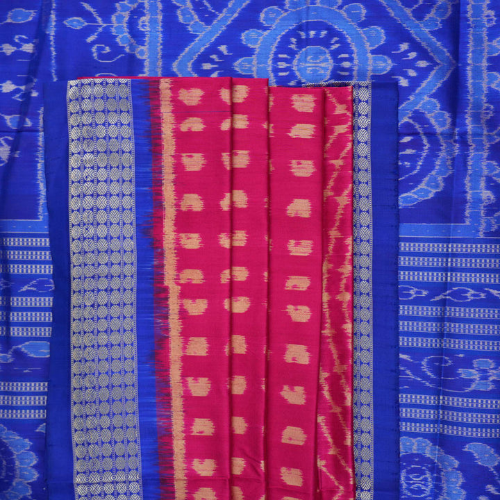 Close-up of Sambalpuri silk fabric texture, revealing the fine handloom weave and quality.