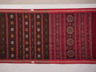 Full layout of brown and red handloom Bomkai cotton saree showing butta body and decorative pallu.