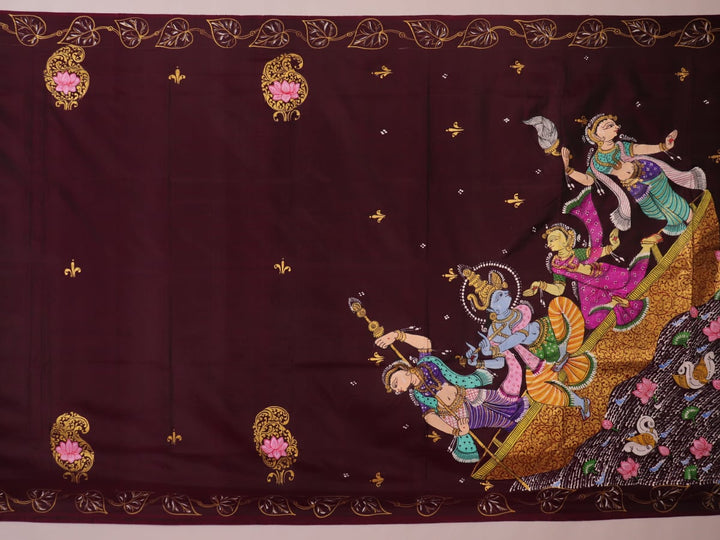 Close-up of a hand-painted silk Patachitra saree, highlighting the vibrant, textured weave and intricate details.