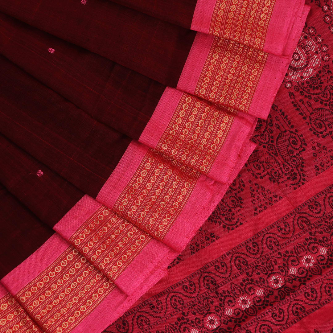 Full view of a maroon and pink cotton Bomkai saree featuring a butta pattern.