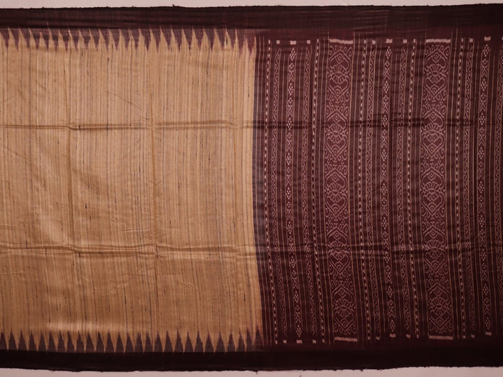 Close-up view of the textured Tussar Silk fabric of a Cream and Maroon Plain Tussar Saree