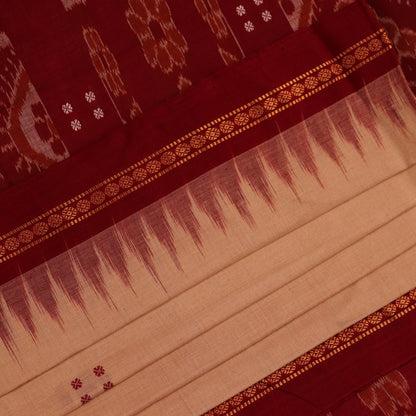 Cream-colored Sambalpuri cotton saree with maroon butta motifs, styled on a model