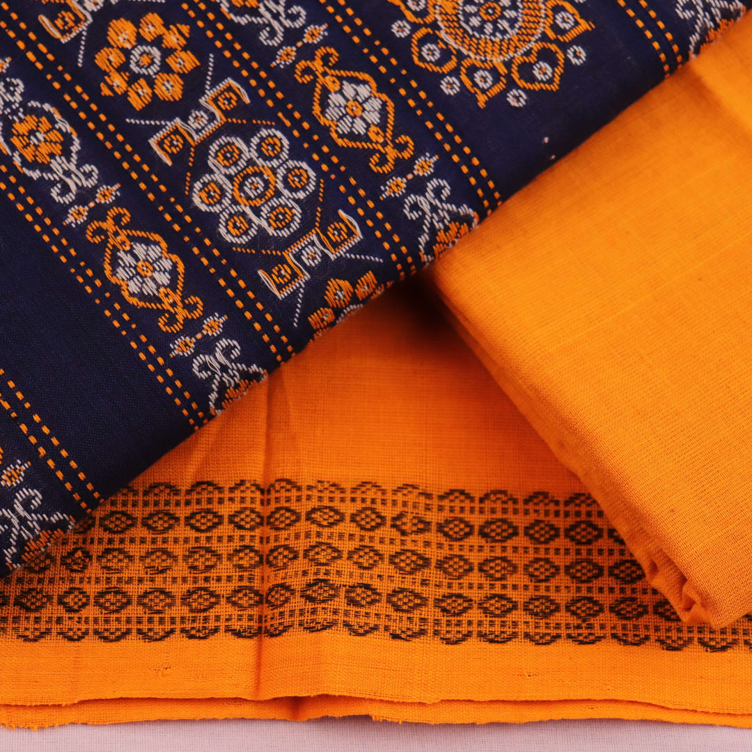 Detailed view of the matching blue and black Bomkai Cotton dress material blouse piece.