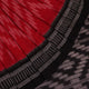 Red and black Sambalpuri cotton saree with motifs, elegantly draped.