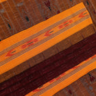 Styling view of a plain maroon and yellow Sambalpuri cotton saree.