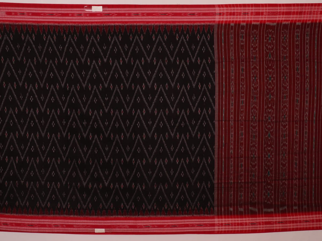 Model wearing a black and red Sambalpuri cotton saree, showing drape and overall style.