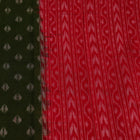 A woman wearing a green and red cotton Sambalpuri dupatta with motifs draped over her shoulder