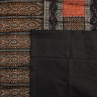 Ultra close-up of Bomkai Silk Saree fabric, revealing intricate handloom texture and butta weave details.