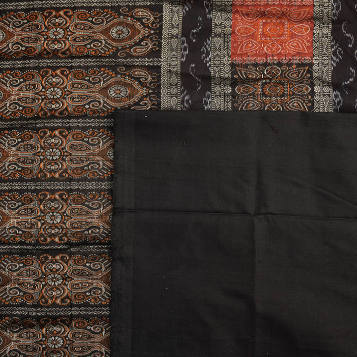 Ultra close-up of Bomkai Silk Saree fabric, revealing intricate handloom texture and butta weave details.