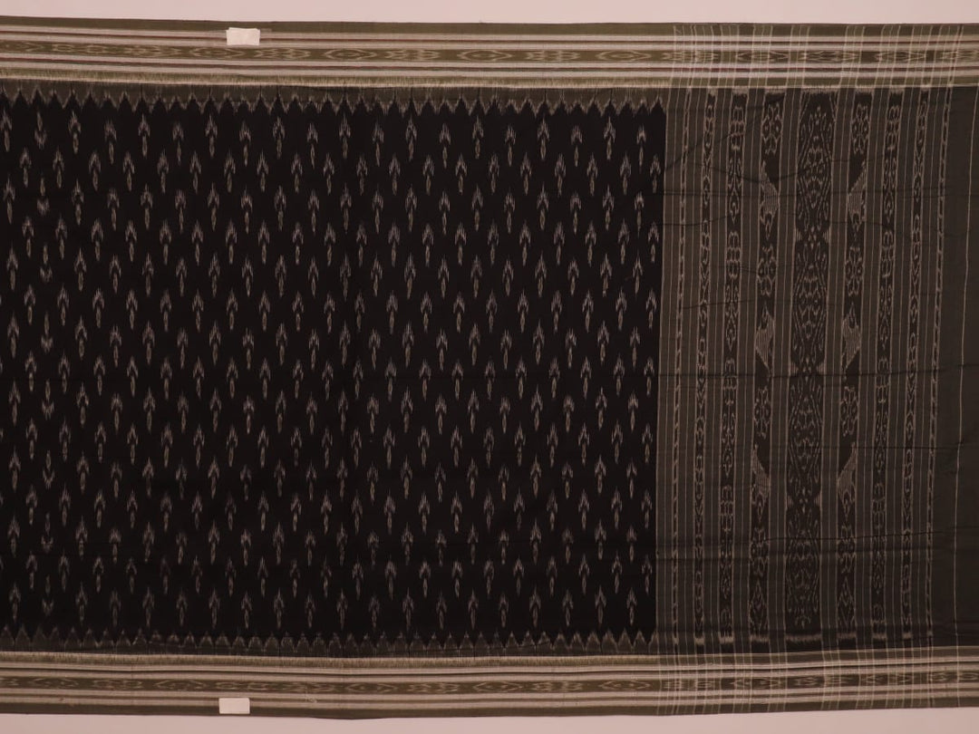 Saree styled; black Sambalpuri cotton saree with grey motifs showcased in a draped presentation.