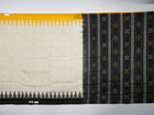 Close-up of the luxurious Berhampuri Silk Saree fabric, revealing the fine weave and soft texture.
