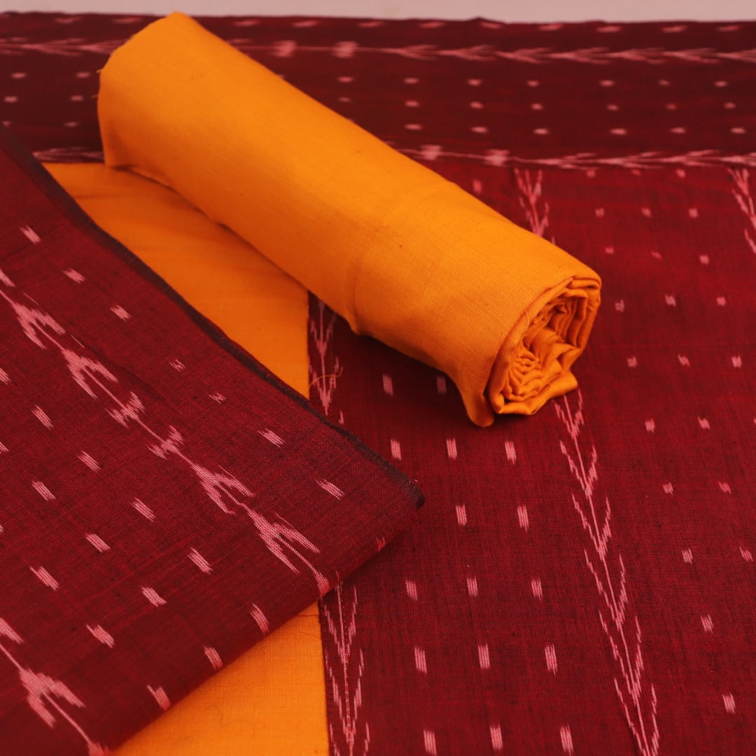 Detail of maroon and yellow motif Sambalpuri cotton dress material blouse piece.
