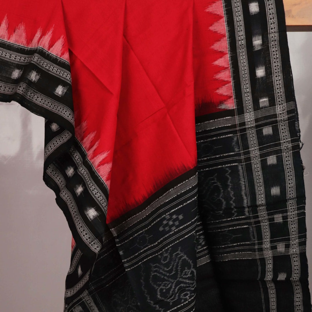 Styling view of a red cotton Sambalpuri dupatta with black plain pattern