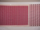 Full length view of a white and multi-color striped Sambalpuri cotton saree showing the complete design.