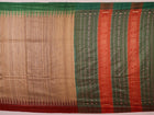 Close-up of plain off-white Tussar silk saree fabric, showing natural slub texture and rust weave.