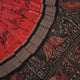 Full layout view of a rust and black Sambalpuri cotton saree displaying the complete body pattern and motifs.