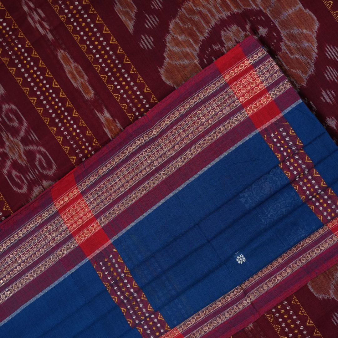 Full layout of the blue Bomkai cotton saree with red border and butta motifs, showcasing the entire design.
