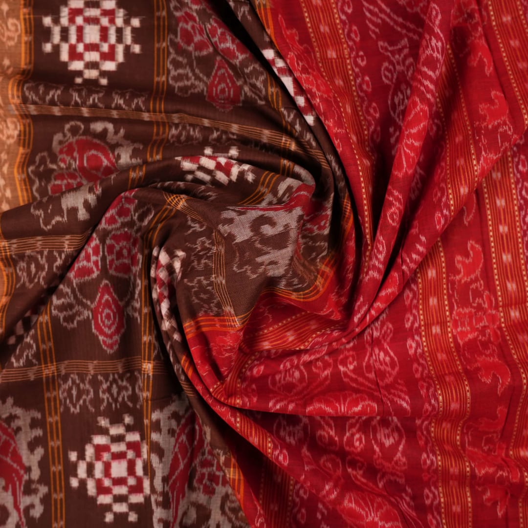 Model draped in brown and red Pasapalli Sambalpuri cotton saree showcasing traditional Odisha handloom