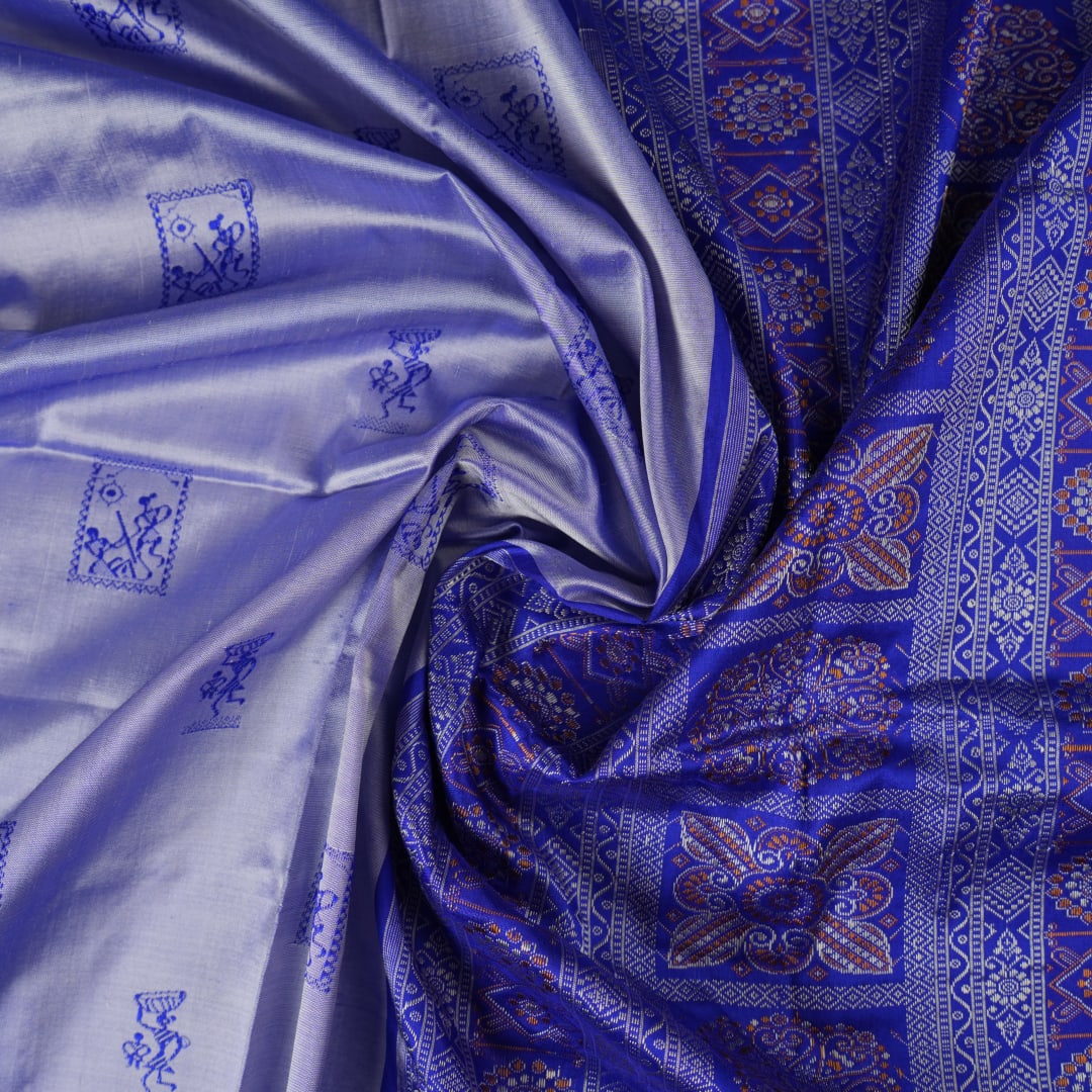 Ultra close-up of Bomkai Silk Saree fabric, highlighting the exquisite grey and blue weave texture.