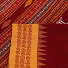 Full view of a maroon and yellow cotton Berhampuri saree with butta pattern.