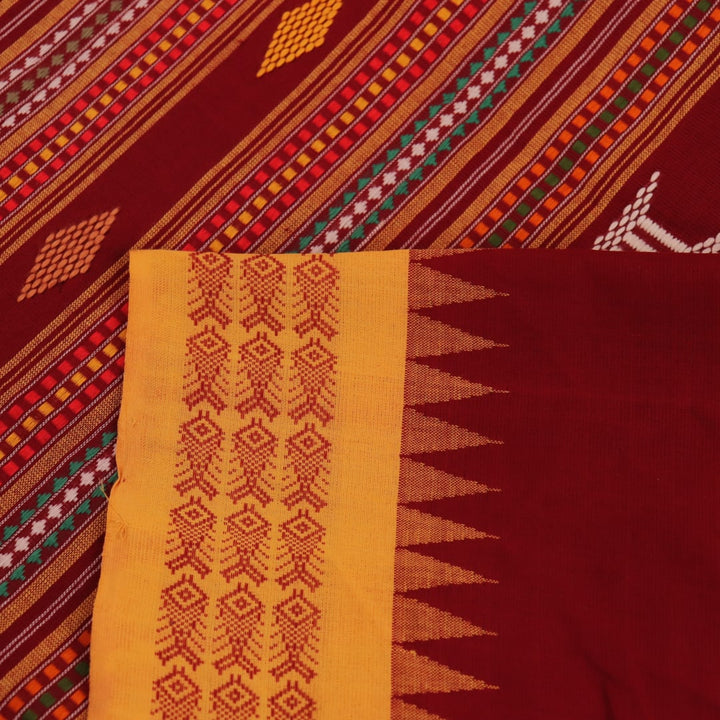 Full view of a maroon and yellow cotton Berhampuri saree with butta pattern.