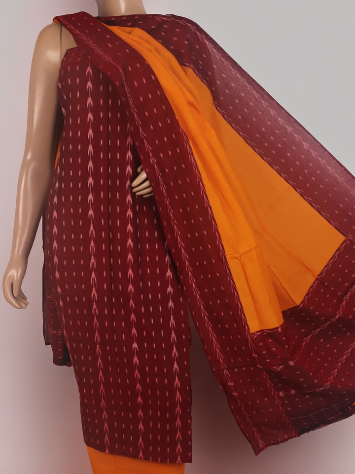 Detail of maroon and yellow motif Sambalpuri cotton dress material blouse piece.