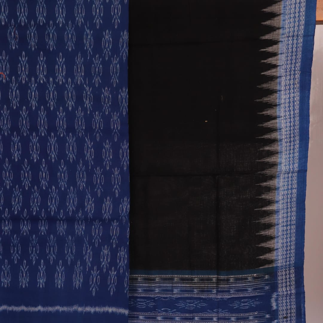 Close-up of Sambalpuri cotton dress material's blue and black body with intricate motifs