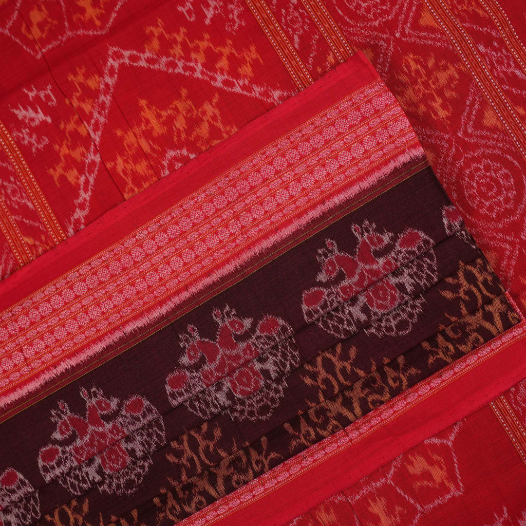 Full layout of a maroon and red Sambalpuri cotton saree displaying the complete body motifs and border.