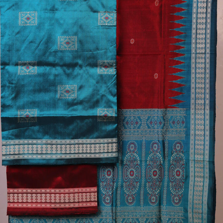 Detail of blue Bomkai silk dress material blouse piece with maroon butta.