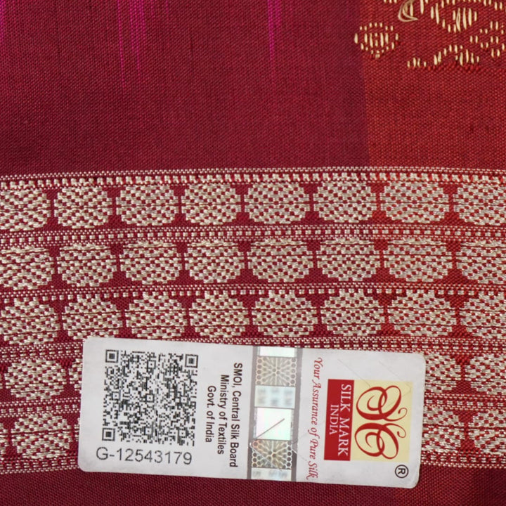 Ultra close-up of Bomkai silk saree fabric, revealing its luxurious texture and fine handloom weave.
