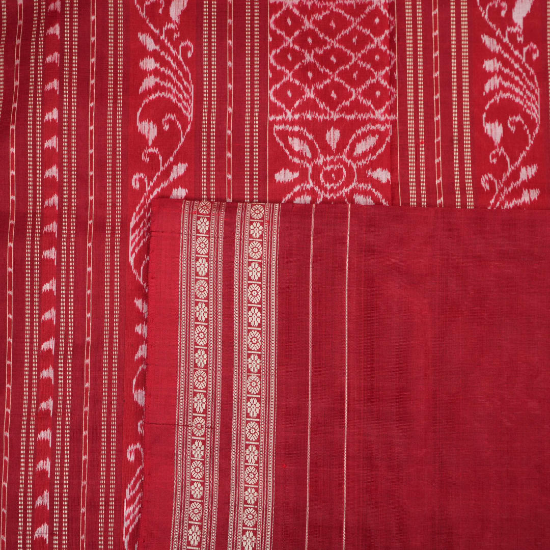 Full view of the maroon Sambalpuri silk saree with traditional motifs, displaying entire length and border.