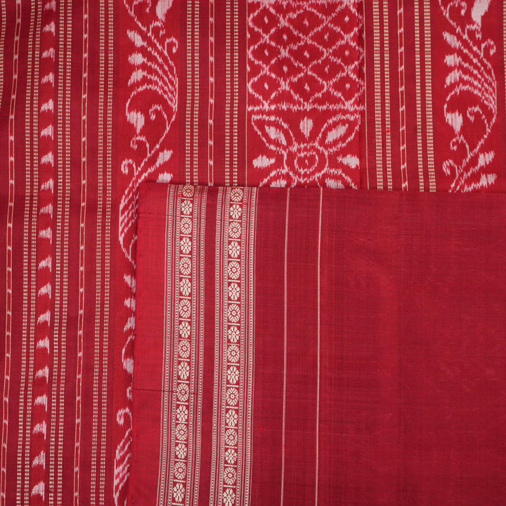 Full view of the maroon Sambalpuri silk saree with traditional motifs, displaying entire length and border.