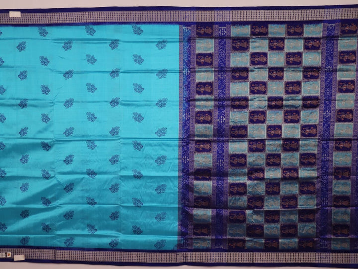 Close-up showcasing the silk texture of a blue and blue Bomkai silk saree with a butta pattern.