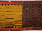 Green and black Khandua silk saree draped; showcasing its butta pattern and elegant fall.