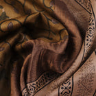 Close-up of printed multi-color handloom Tussar silk saree fabric texture.