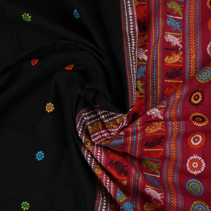 Full view of the black and red Dolabedi cotton saree laid out to show the complete pattern and pallu.
